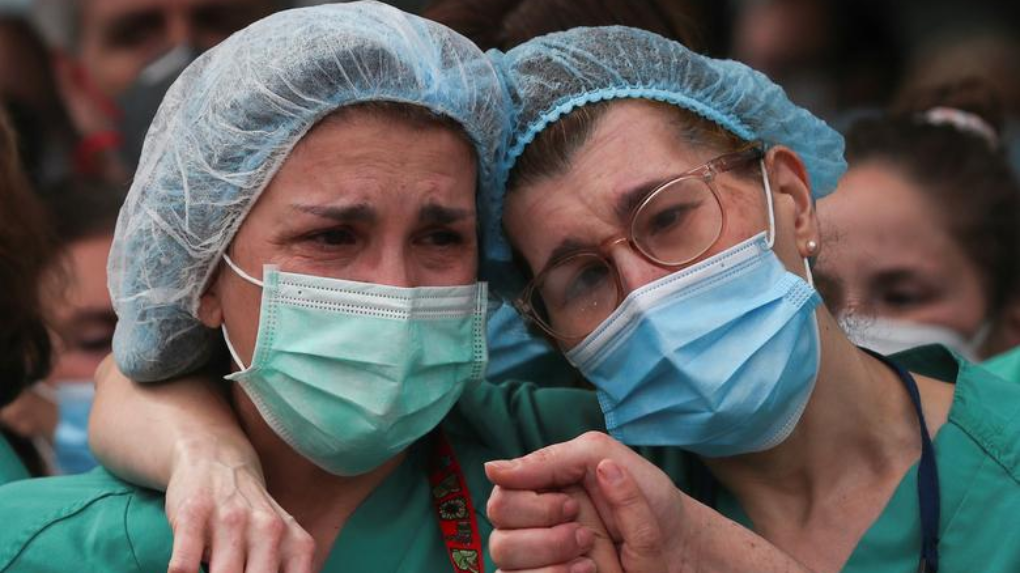 Health workers wear protective face masks Health workers wear protective face masks